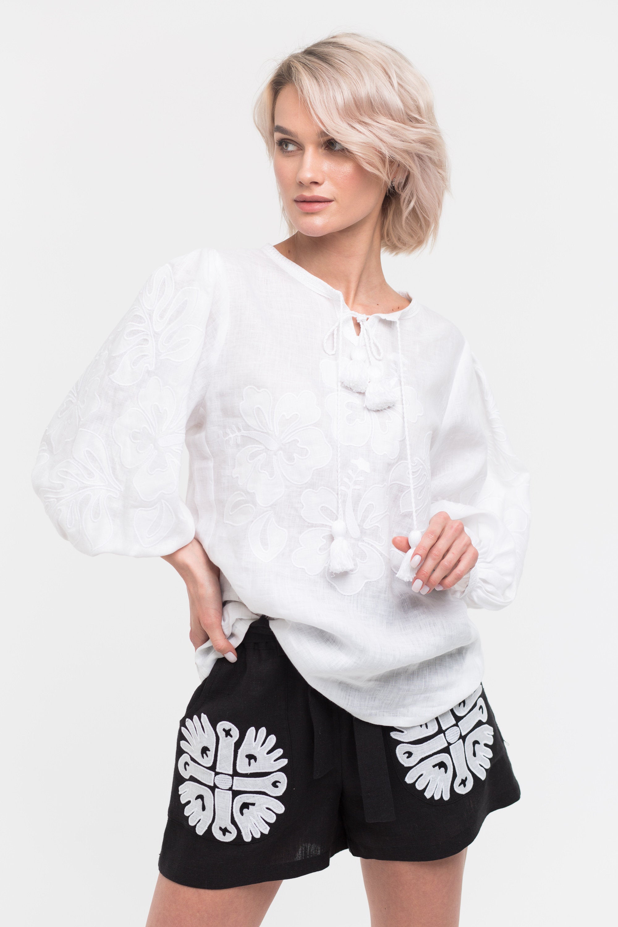 Applique embroidered black linen shorts