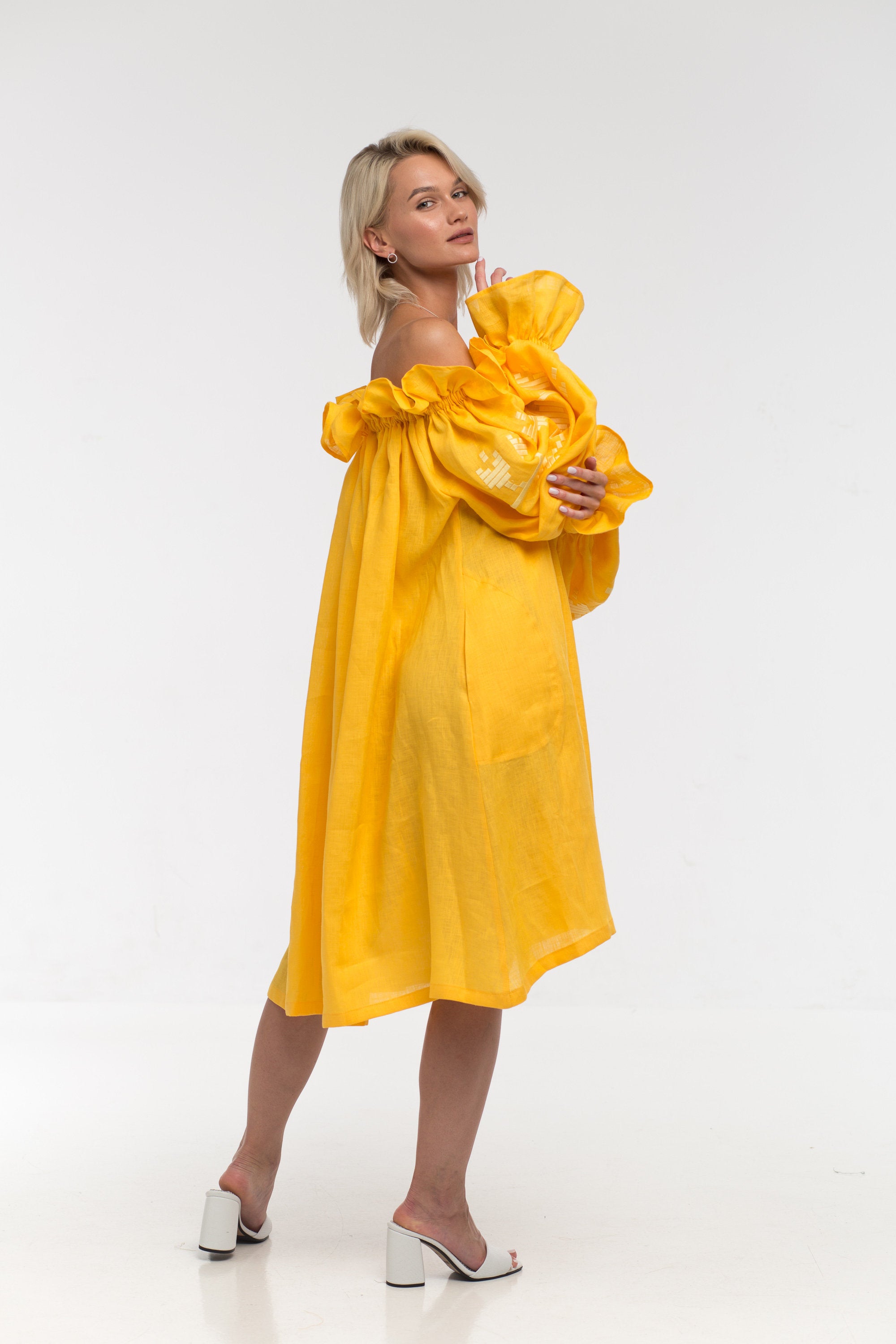 Off shoulder linen dress oversized with ruffles and embroidered balloon sleeves