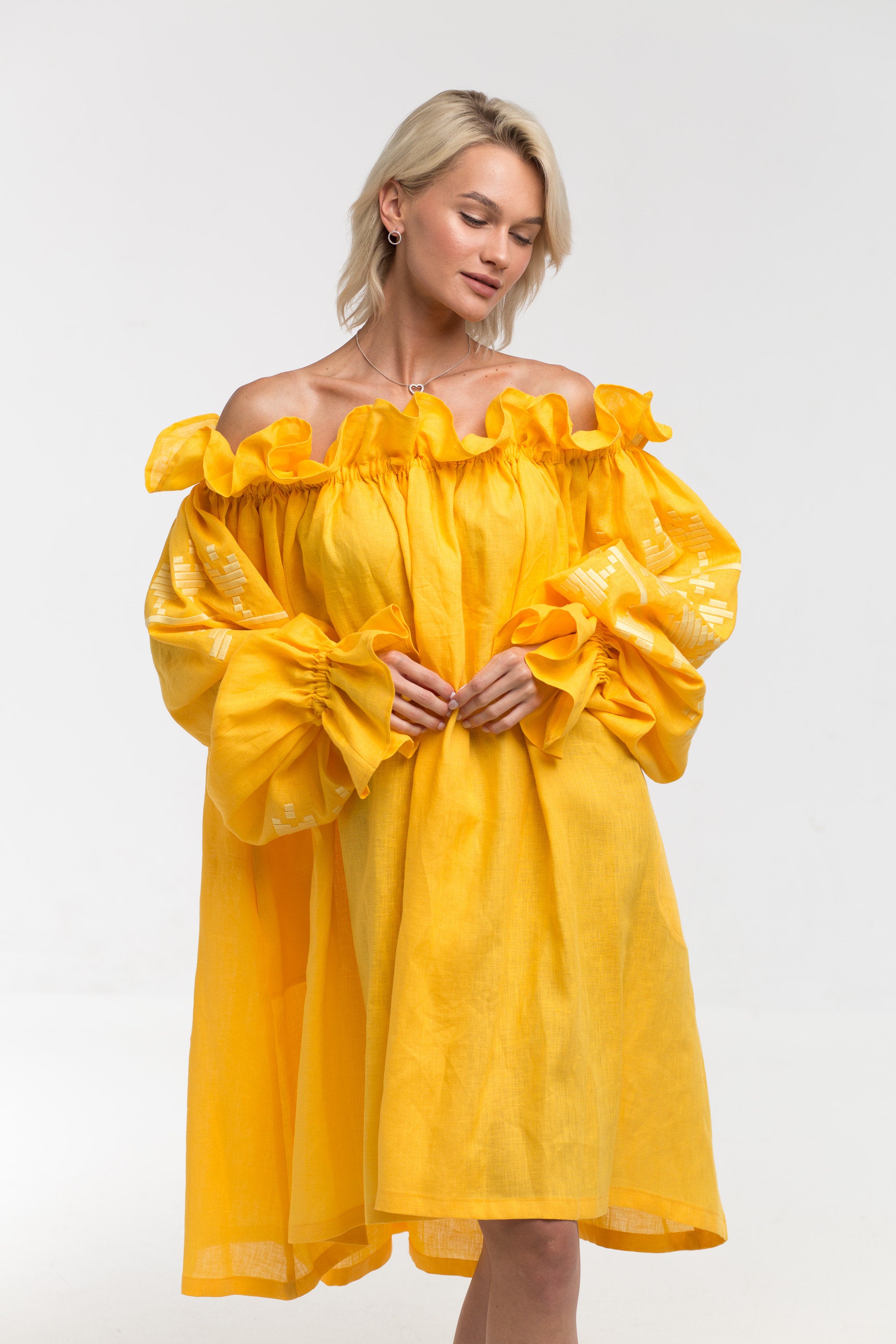 Off shoulder linen dress oversized with ruffles and embroidered balloon sleeves